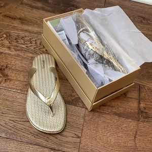 Brand new gold Michael Kors flip flops